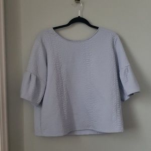 Blue top with flare sleeves